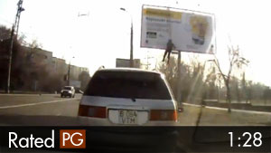 Rear-End Crash as Worker Falls From Billboard